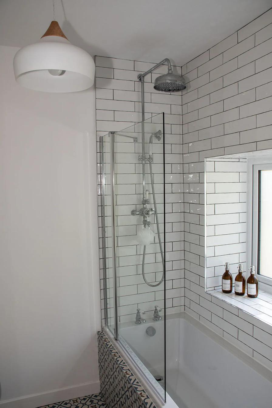 Guest bathroom with tiled shower