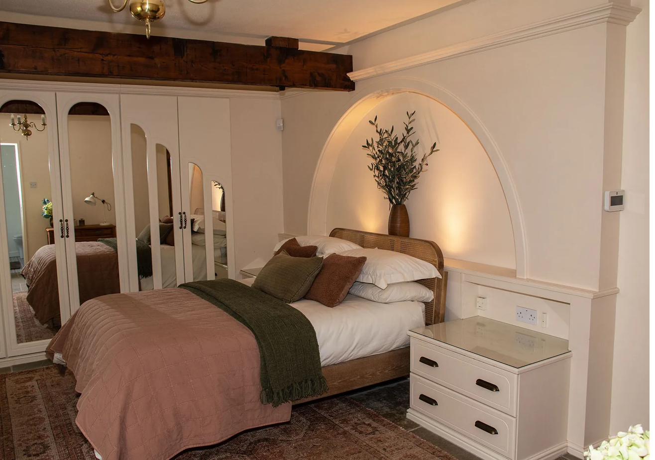 First bedroom with soft linens