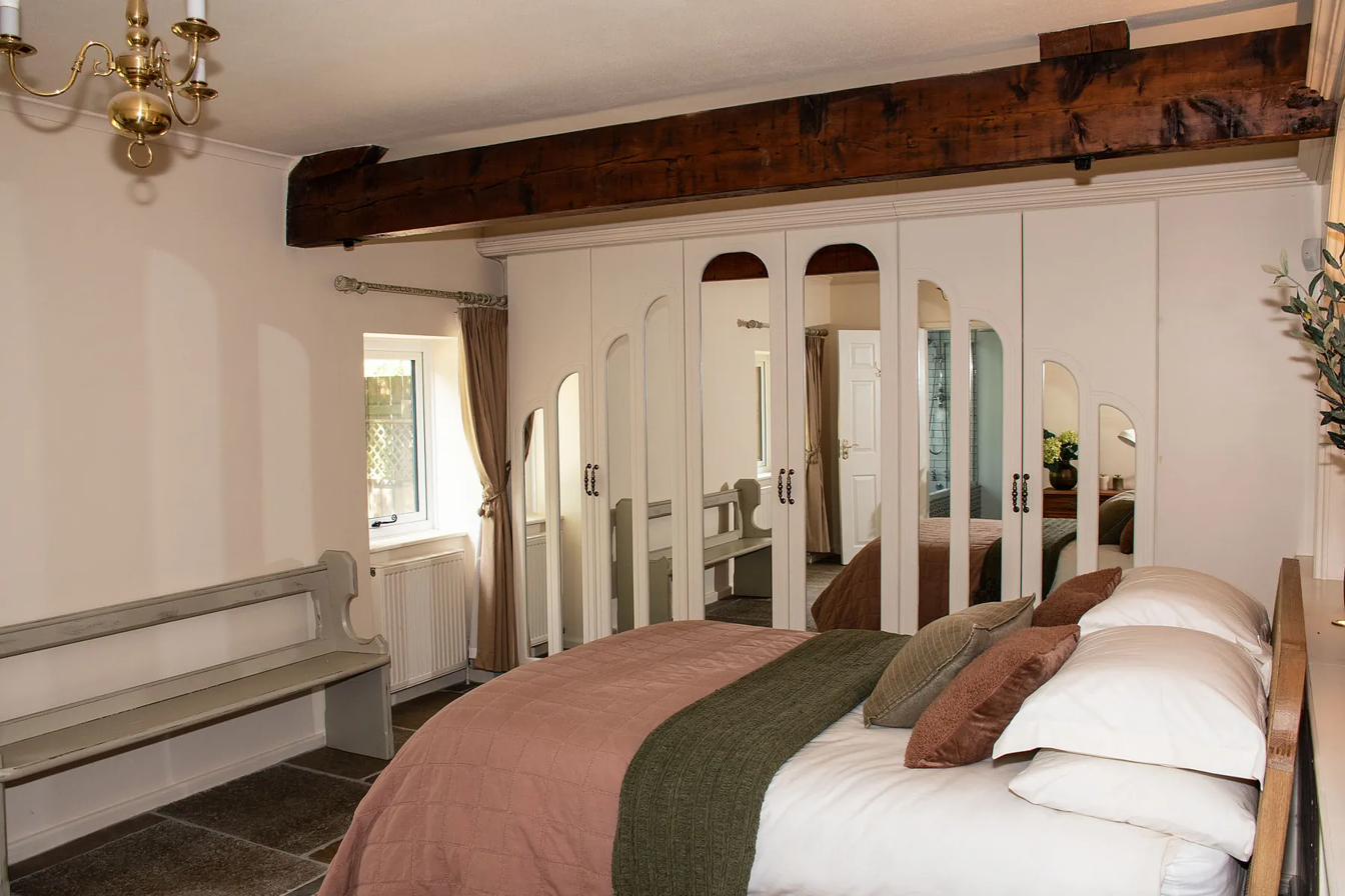 Wardrobe and first bedroom
