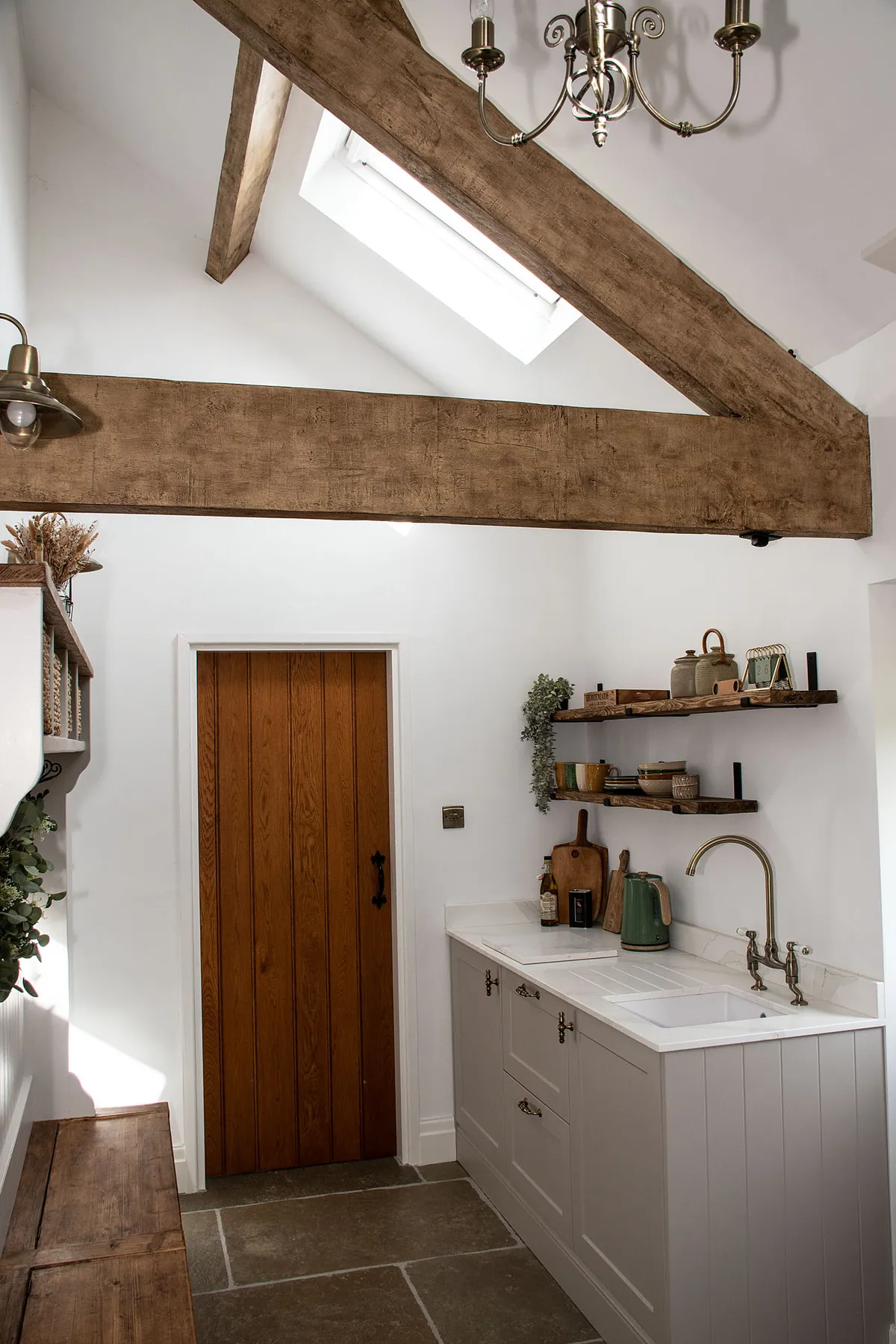 Guest kitchenette with traditional timber beams
